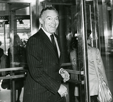 Leonard Lauder smiling as he enters a retail store