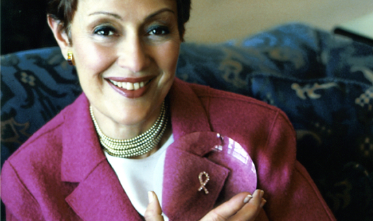 Evelyn Lauder magnifying pink ribbon lapel pin